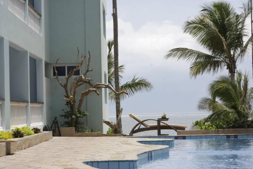 Апартаменты Cowrie Beach Haven Studio Момбаса Экстерьер фото