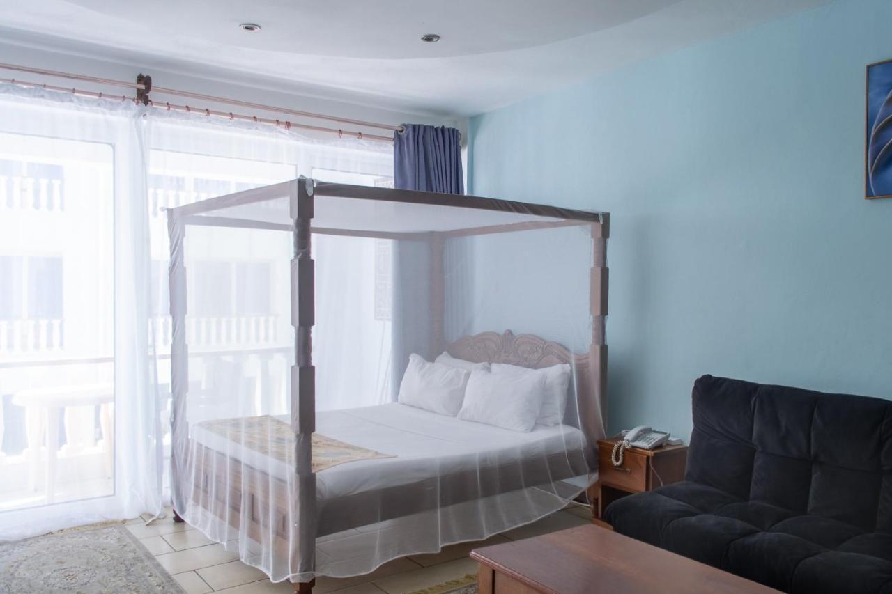 Апартаменты Cowrie Beach Haven Studio Момбаса Экстерьер фото