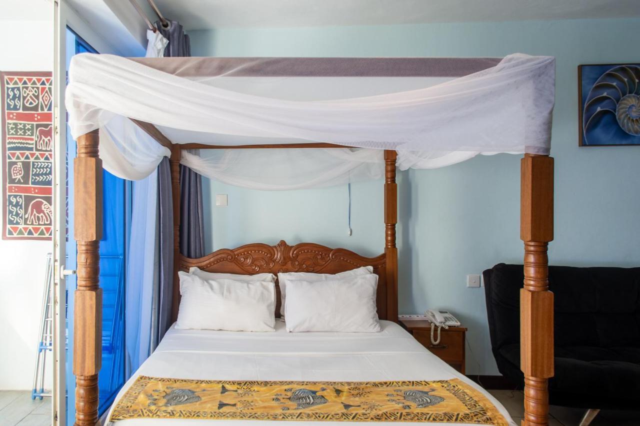 Апартаменты Cowrie Beach Haven Studio Момбаса Экстерьер фото